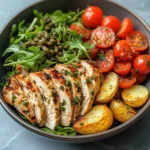 Herbed Chicken Bowl with Crispy Potatoes & Tomato Caper Salad